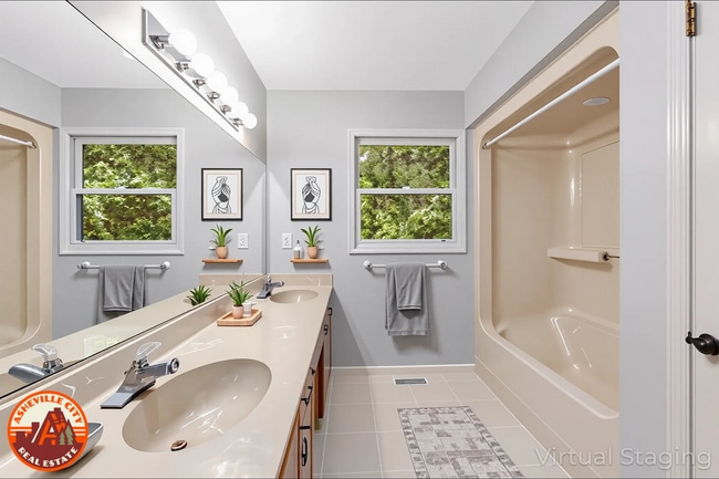 Building Photo - Bright 2-Bedroom Townhouse with Garage & P...