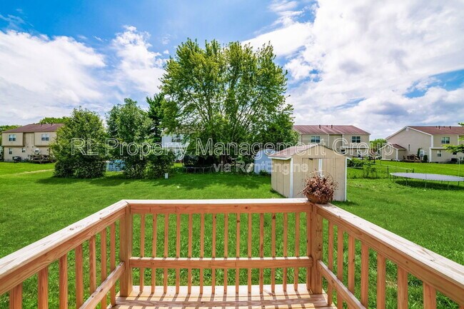 Building Photo - 7179 Feather Ct