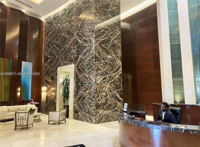 Building Photo - 15811 Collins Ave