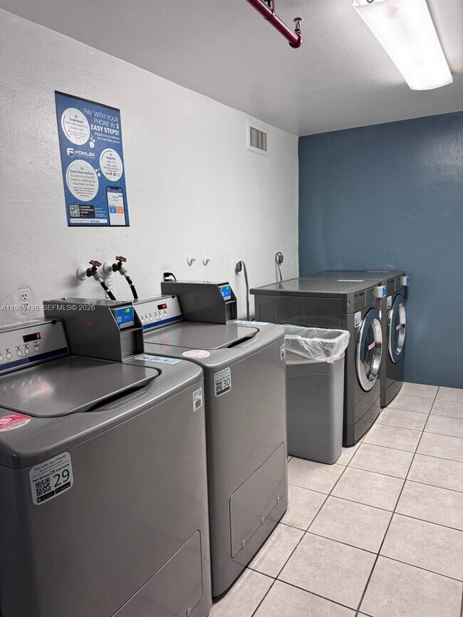 Building Photo - 19380 Collins Ave