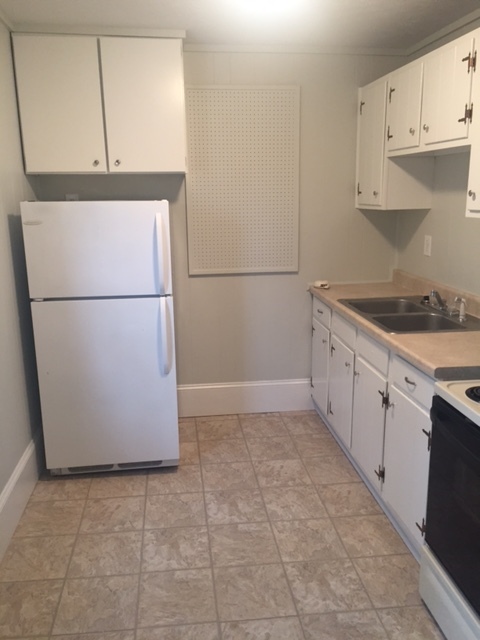 Kitchen; refrigerator has been moved from this area and put next to stove to allow for extra storage space. - 905 Schuyler St