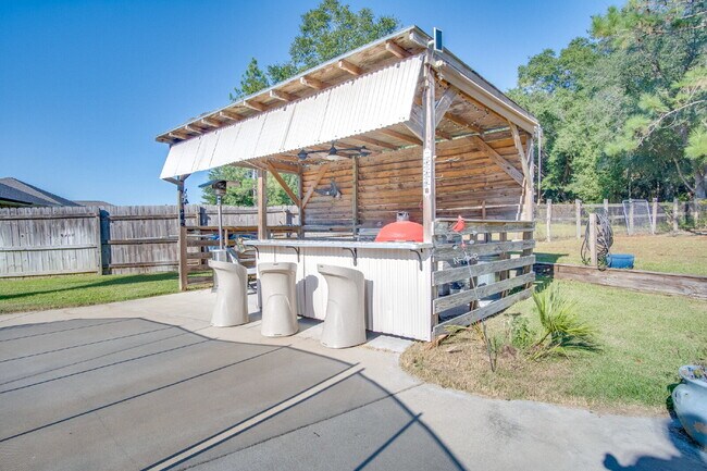 Building Photo - Backyard Bliss: Pool, Cabana & Fire Pit in...
