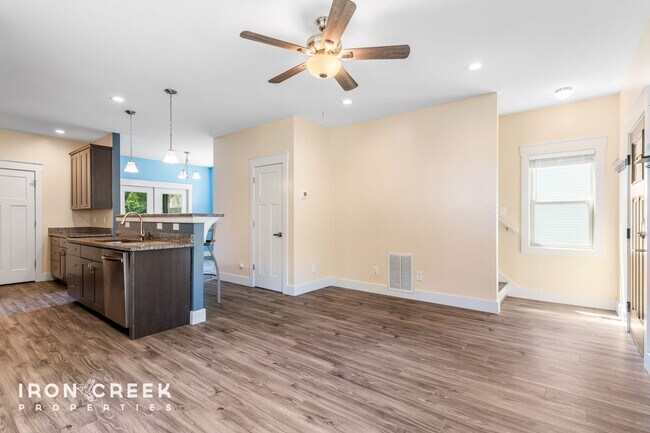 Building Photo - Modern Three-Bedroom Home with Screened Po...