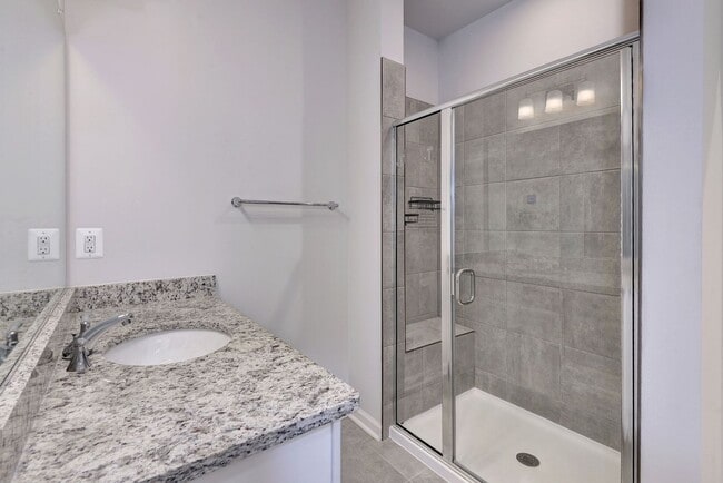 Building Photo - Three Story Brick End Unit with Rooftop Terrace