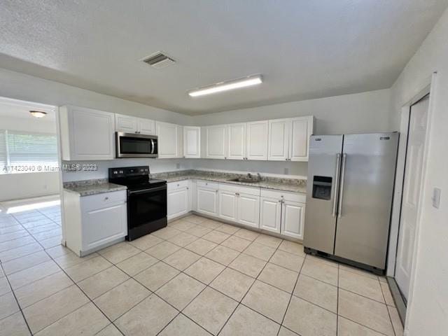 Building Photo - 5180 SW 43rd Terrace