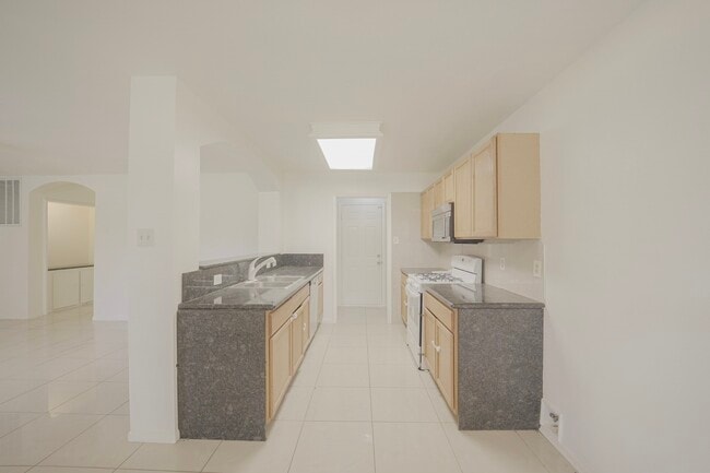 Building Photo - 9811 Mango St
