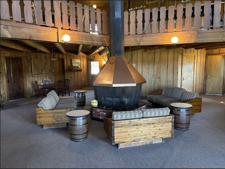 Common area with fireplace - 225 Co Rd 804