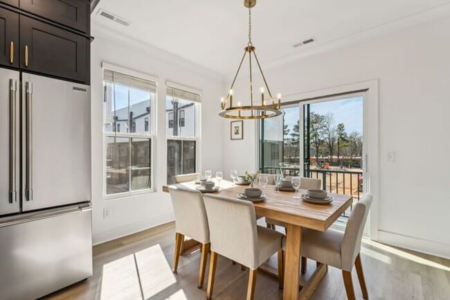 Building Photo - High-End 2BR Townhome | Rooftop Terrace + 2-Car Garage | 24-Unit Community