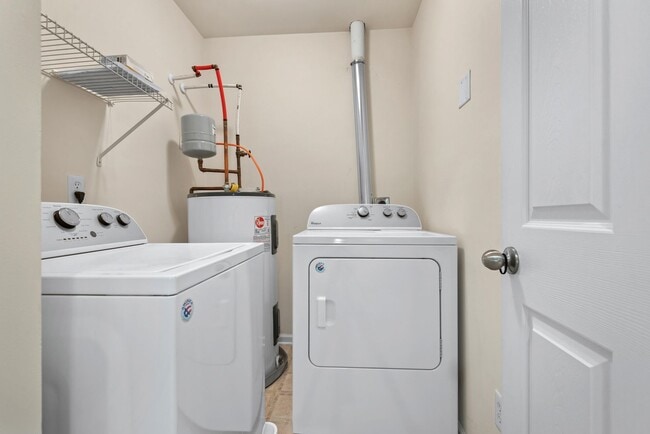 Building Photo - Available Now! Pet-Friendly 3-Story Townhome Near Wake Forest – Get $500 Off Your First Month!