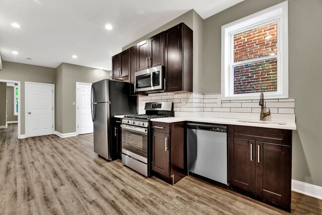 Building Photo - Fully Renovated 3 Bedroom Rowhome- Baltimo...