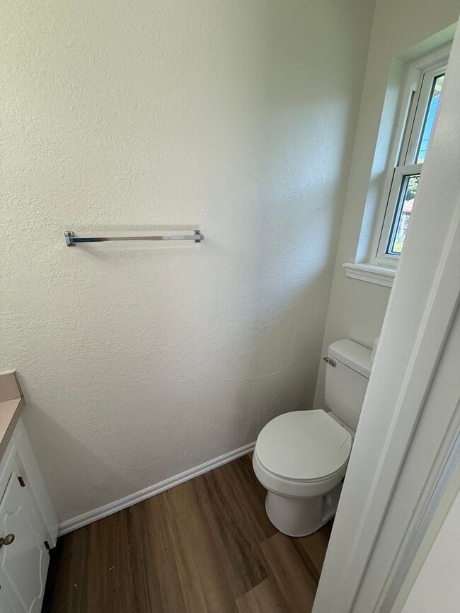 Building Photo - Brand new appliances, flooring, paint, and...