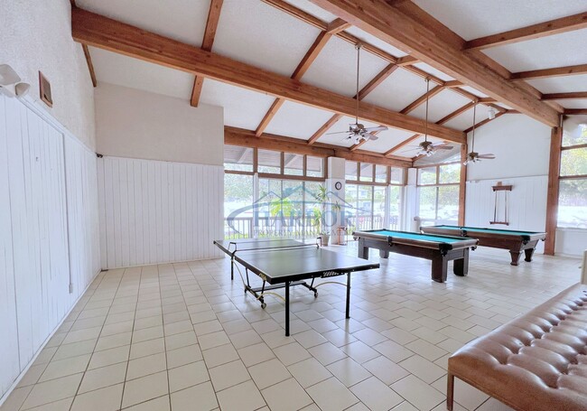 Building Photo - Stylish Condo with Pool, Fitness Center & ...