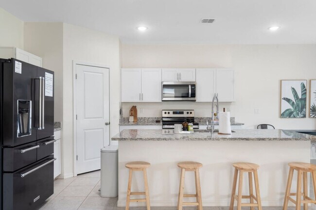 Building Photo - 9520 W Albeniz Pl