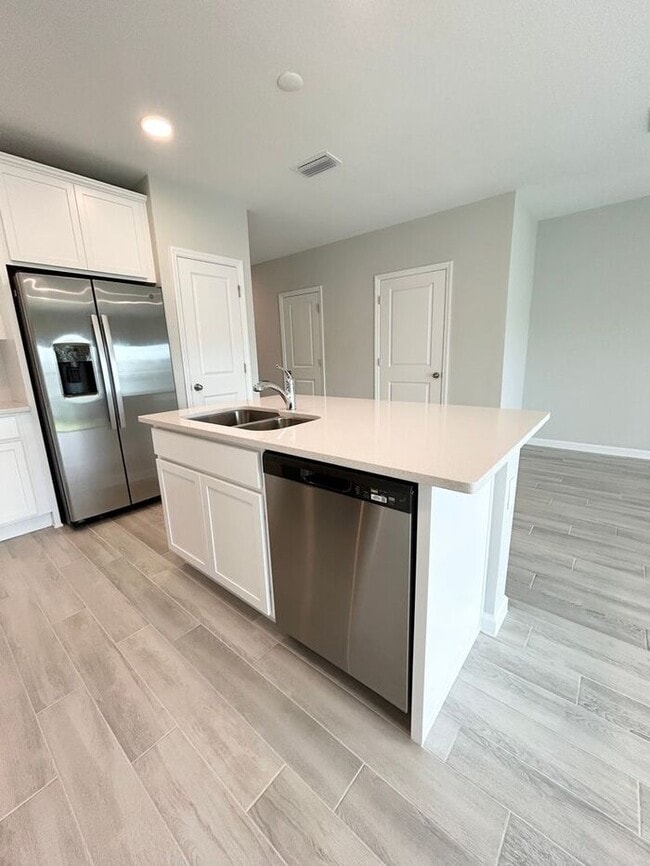 Building Photo - Brand-New 3/3 Modern Townhome in Gated Tys...