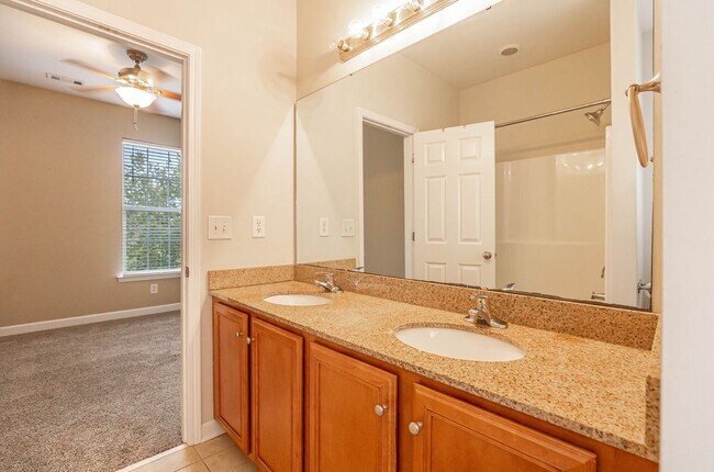 Building Photo - Located just Steps from Shopping, Dining, ...