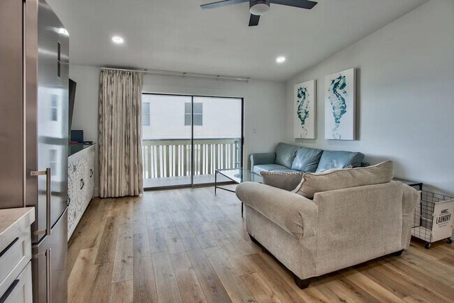 Building Photo - 50% off first months rent.  Gulf front com...