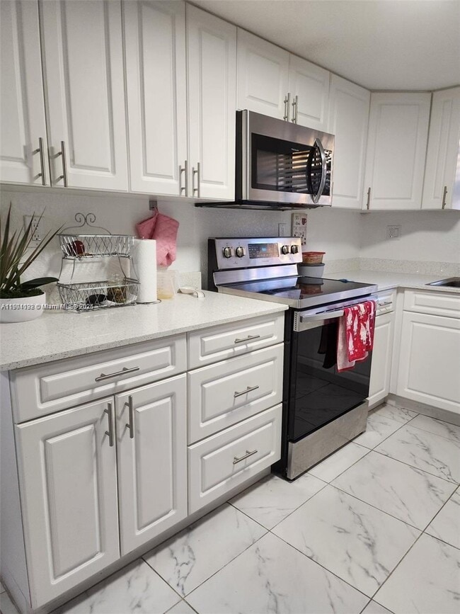 Building Photo - 5100 W 12th Ln