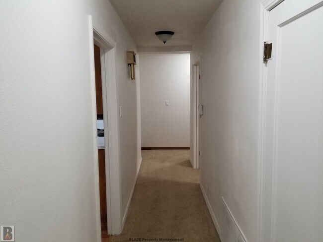 Building Photo - Massive Corner-Lot Home with Retro Charm & Shady Backyard!