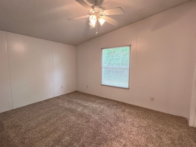 Building Photo - AVAILABLE NOW | PETS PERMITTED OUTDOORS ON...