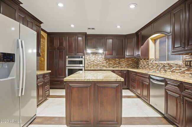 Building Photo - 7775 N 52nd Dr