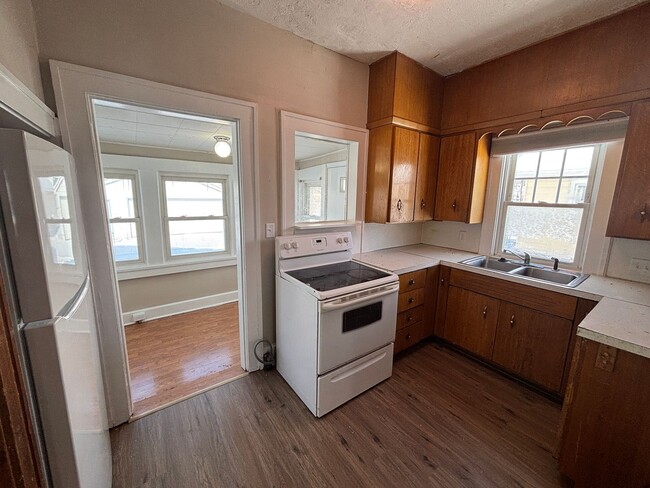 Primary Photo - 4 Bedroom, 1 Bathroom home with 2+ car gar...