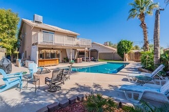 Building Photo - FURNISHED 2 Bedrooms plus den/loft & Private Pool