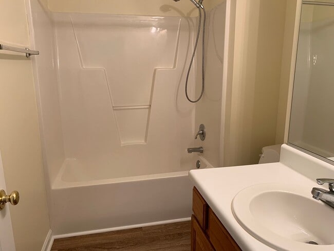 Building Photo - SPACIOUS HOME WITH DOWNSTAIRS PRIMARY BEDROOM AND BATH- LAKE WHEELER/ FARMER'S MARKET AREA