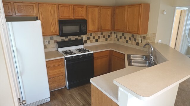 Building Photo - SUPER ADORABLE 2-Story, 2 Bedroom / 2.5 Bathroom Townhome!