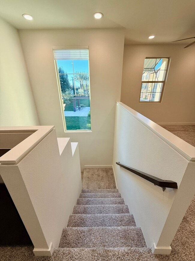 Building Photo - Stunning 3-Bed/2.5-Bath End Unit Condo with Solar & Large Yard