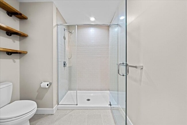 Building Photo - Stylish Industrial Loft with Exposed Brick, High Ceilings & Modern Kitchen