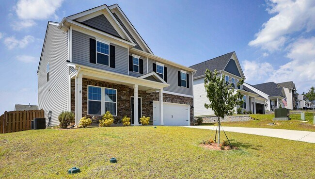 Building Photo - Sophisticated Like-New 4-Bedroom Home with Designer Finishes & Fenced Backyard!