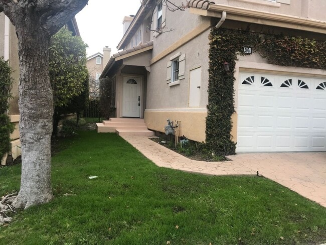 Building Photo - Located on a cul-de-sac, within the gated ...