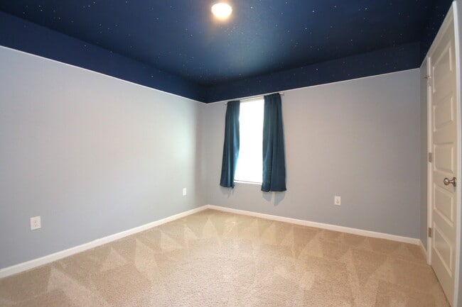 Building Photo - Spacious 5-Bedroom Home Near NAS with Move...