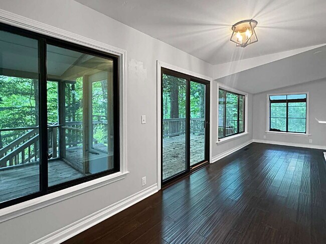 Building Photo - Modern Lake Lanier Retreat | 3BR/3.5BA | Private Swim Dock