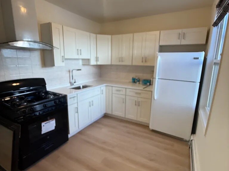 Building Photo - 818 Communipaw Ave