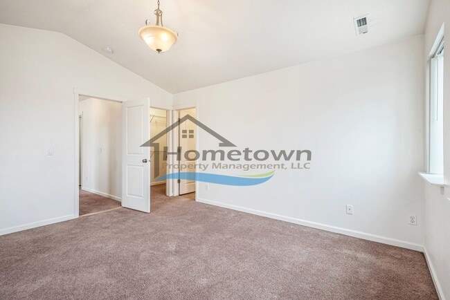 Building Photo - Townhouse Style Home with 3 Bedrooms, 2.5 Bathrooms, and a 2-Car Attached Garage Available in Coe...