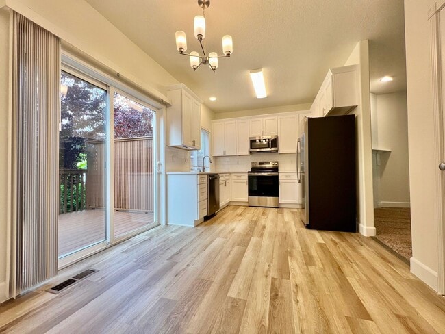 Building Photo - NEWLY RENOVATED! Spacious 2-Bedroom Townhome in a Charming Cul-de-Sac!