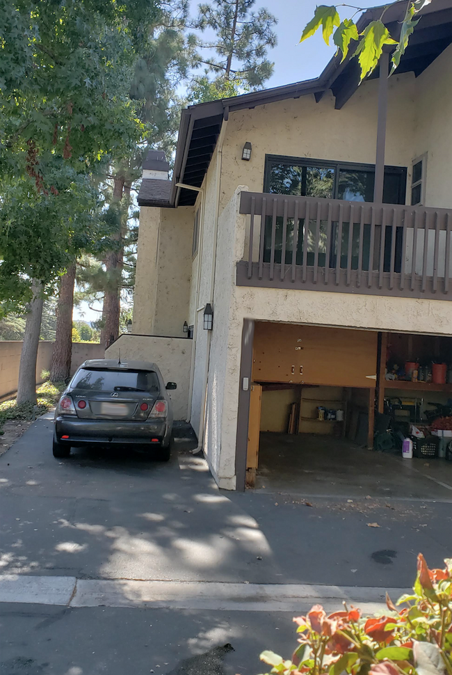 Outdoor parking space and shared 1/2 of 2-car garage - 6716 Clybourn Ave