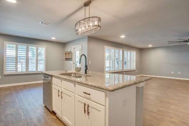 Building Photo - Move In for the Holidays! Heated Saltwater Pool & Tropical Backyard –$500 OFF First Month + Milit...