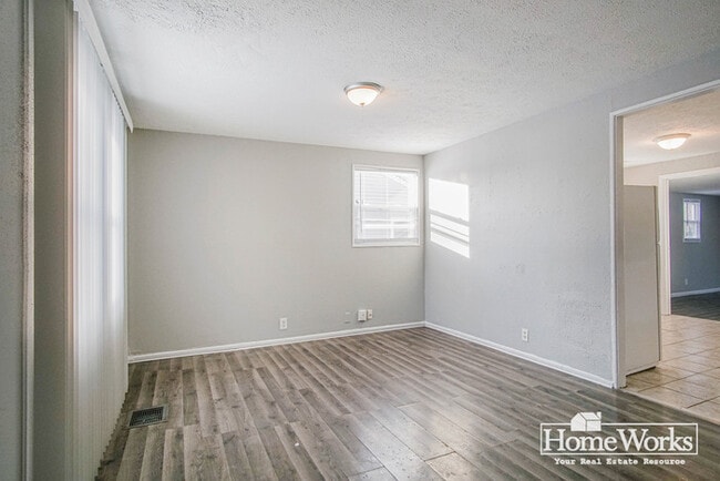 Building Photo - Well-maintained two-bedroom, one-bath home with a practical layout, & cozy living areas.