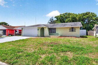 Building Photo - 8905 Tropical Palm Way