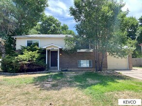 Building Photo - Great and Spacious Home with Backyard!