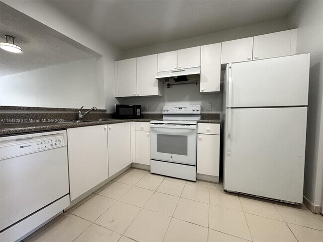 Building Photo - 8900 Collins Ave