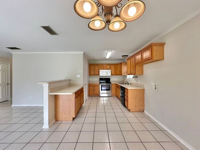 Building Photo - Available Now! Spacious 3 Bedroom 2 Bath D...