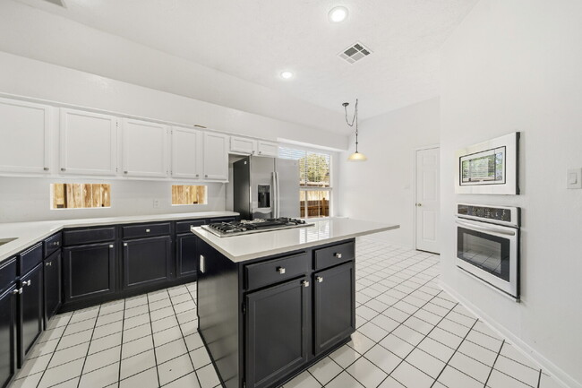 Building Photo - Peaceful Single-Story Home with Updated Flooring & Included Appliances