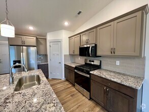 Building Photo - Newly built 3-bedroom duplex in Irvine Acres!