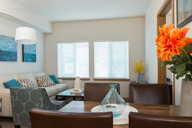Relax in your spacious living room - Reserve at Everett for 55+ Active Seniors