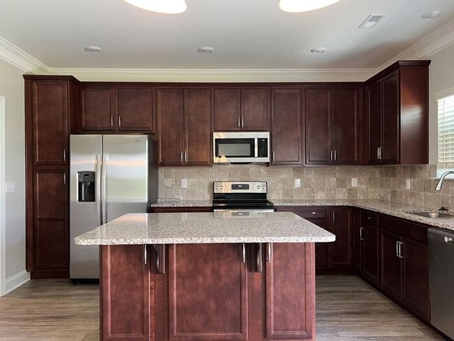 Building Photo - Just Listed in Benson, NC! Your dream home awaits — 4 bedrooms, tons of space, and gorgeous upgra...