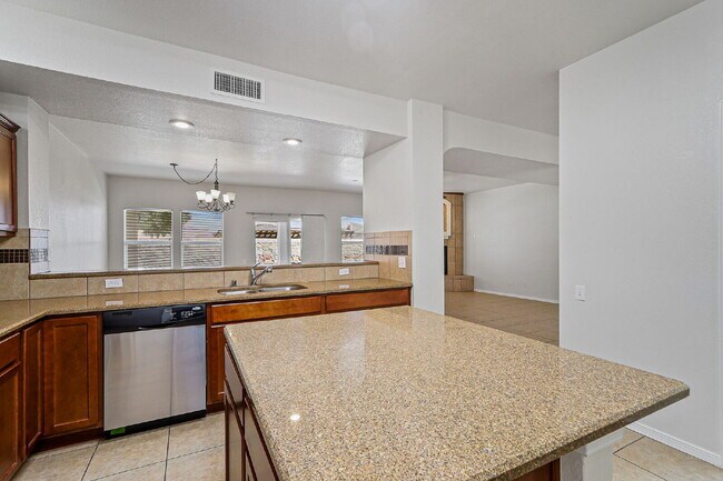 Building Photo - "Spacious 4-Bed Oasis with Granite Touches...