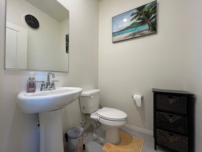 Building Photo - FULLY FURNISHED!!! beautiful 3 bedroom 2 and half bath home is located in the Symmetry Bay Cadenc...